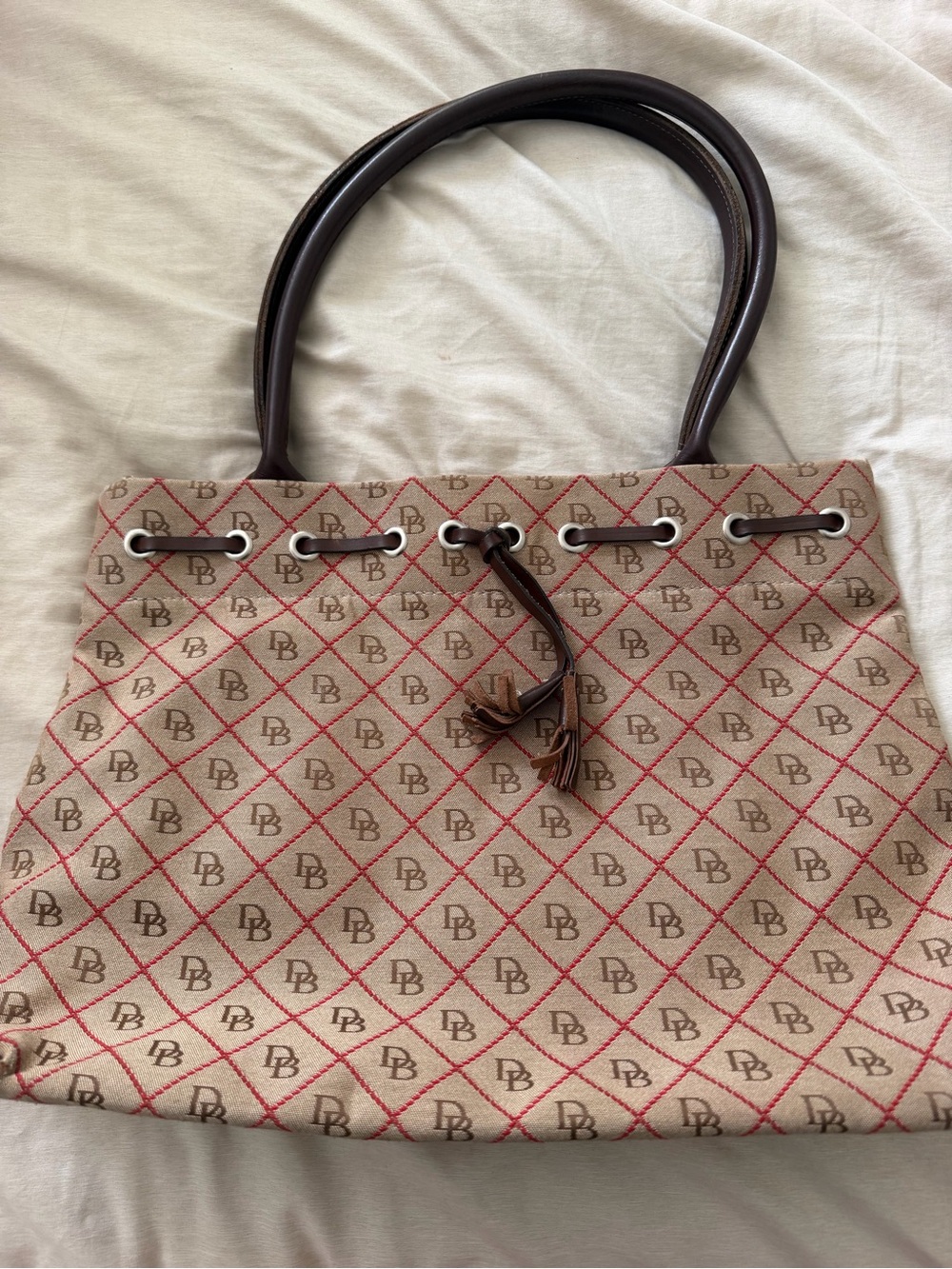 Dooney & Bourke Beige Canvas Shoulder Bag with Red Diamond Pattern
